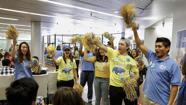 Students and staff cheer on a student who has officially committed to UCLA. The University of California is set to enroll the most diverse class of freshman and transfer students ever. (Jay L. Clendenin / Los Angeles Times)