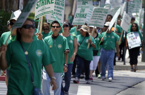 In May, workers joined a two-day strike at UC Irvine Medical Center and four other UC hospitals. Another strike is scheduled for Wednesday. (Glenn Koenig / Los Angeles Times / May 22, 2013)