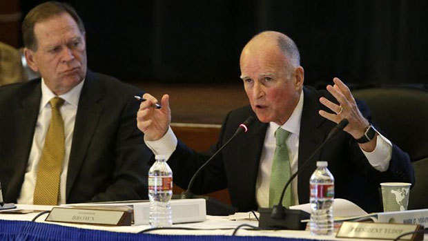 Gov. Jerry Brown speaks at a UC Board of Regents meeting in 2013. On Thursday, the board voted to increase tuition by 5% each of the next five years despite Brown's objections. (Eric Risberg / Associated Press)