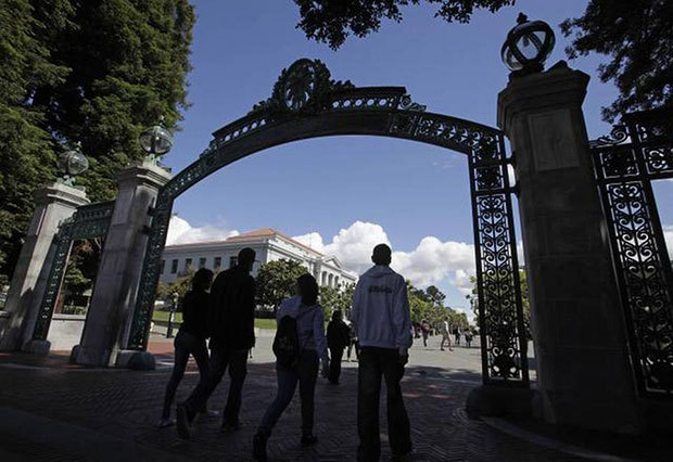  Students walk through the Sather Gate at the University of California, Berkeley. Eric Risberg The Associated Press
