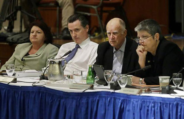  State Assembly Speaker Toni Atkins, from left, Lt. Gov. Gavin Newsom, Gov. Jerry Brown and UC President Janet Napolitano listen to students speak during the public comments portion of the UC Regents meeting in San Francisco last year. The University of California has approved raising tuition by as much as 5 percent in each of the next five years unless the state devotes more money to the 10-campus system. Eric Risberg The Associated Press