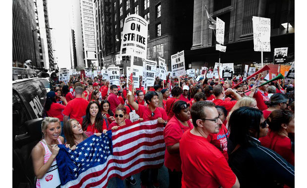 Thousands of public-school teachers rally outside the Chicago Public Schools district headquarters on the first day of strike action in September 2012. (Sitthixay Ditthavong/AP) 