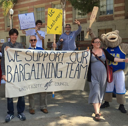 UC faculty and students gathered near Bruin Plaza on Tuesday to rally for negotiations of lecturer benefits and increased job stability. (Courtesy of Mia McIver) 