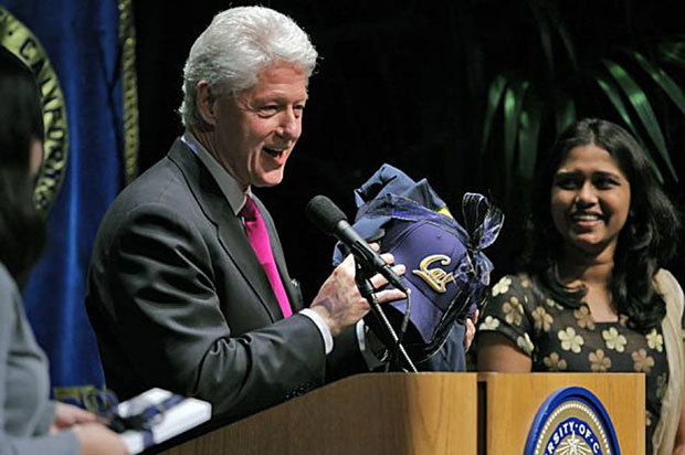 A 2010 file photo of Bill Clinton shows him receiving some Cal souvenirs after delivering a speech at Zellerbach Hall at the UC Berkeley. Photo: Carlos Avila Gonzalez, The Chronicle