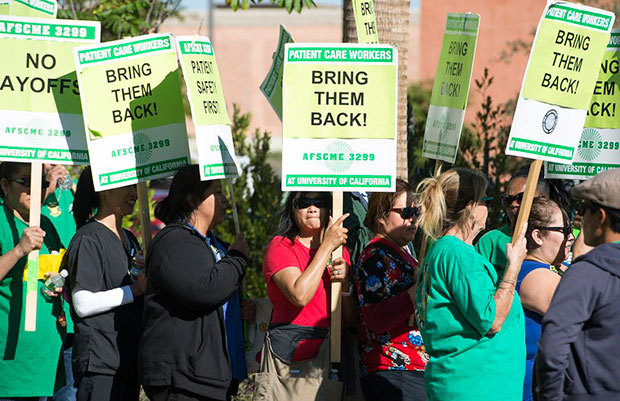 Members of the American Federation of State, County and Municipal Employees, Local 3299 picketed and held a rally Thursday to protest job cuts at UCI Medical Center in Orange. (Photo by Sam Gangwer, Orange County Register/SCNG) 